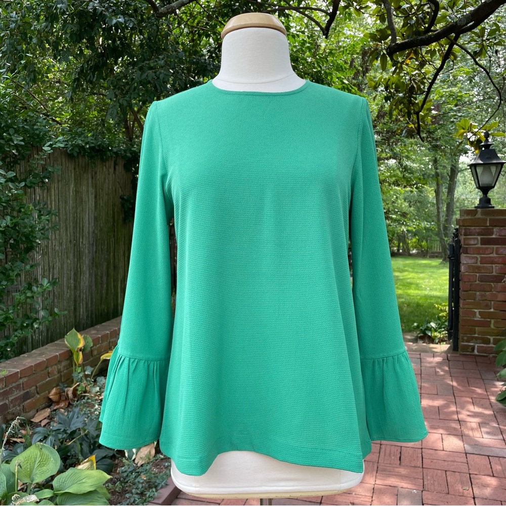 Rungolee green, crepe, crew neck, bell sleeve blouse in size M